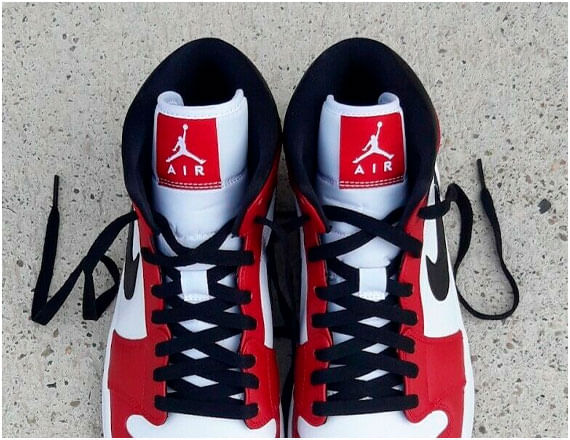 BOTAS WMNS AIR JORDAN 1 MID NIKE | DIONYSOS